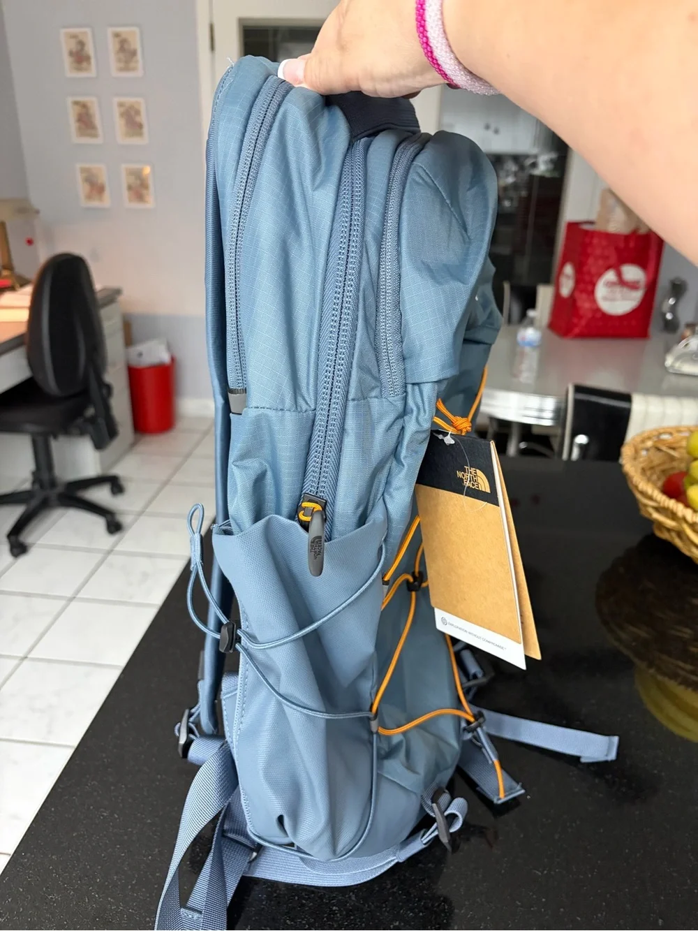 The North Face Borealis Backpack in Granite Grey with Orange Cords